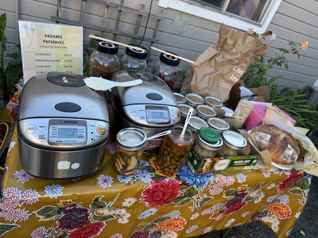 The preservation party table in a Fruitvale backyard, October 2025.